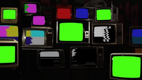 Broken Old TVs with Color Bars and Five Retro TVs turning on Green Screens. Zoom In. You can Replace Green Screen with the Footage or Picture you Want with “Keying” effect in After Effects.