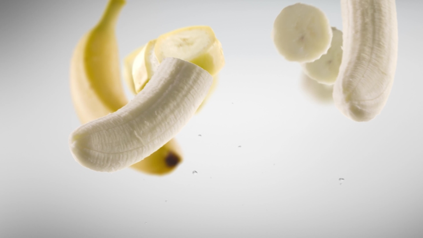 Flying of Banana and Slices with Luma Matte Royalty-Free Stock Footage #1045287880