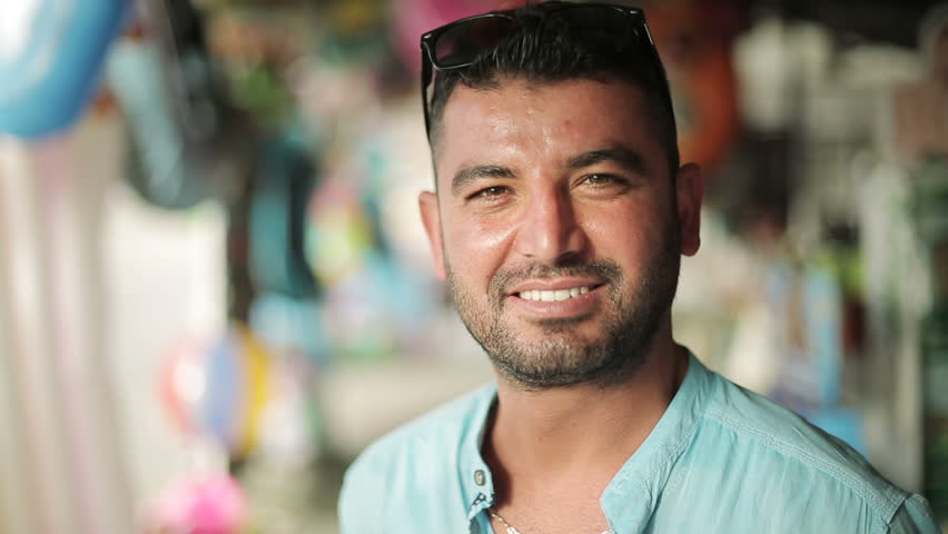 Portrait of the Turkish man of the seller on market