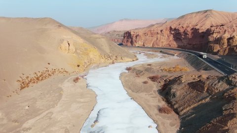 Aerial view of China Xinjiang Taklamakan Desert Aera Canyon in winter season. Drone shot footage 4k(UHD).