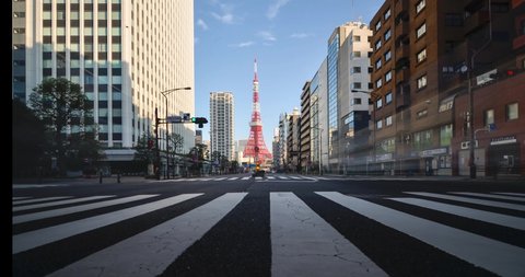 January2,2020:Tokyo,Japan:Time-lapse view of business area street with view of Tokyo Tower in day time. Tokyo famous tourist attraction area.Tokyo Olympic 2020 4K UHD video of Tokyo city in japan