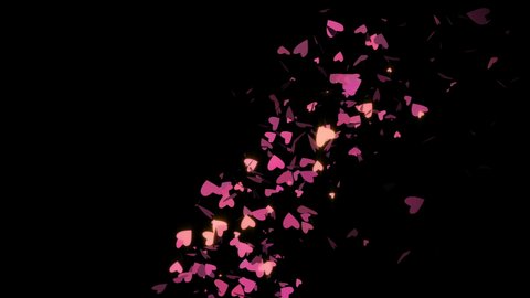 4k Confetti explosion. Falling pink hearts particles. Valentines day wallpaper. Isolated on black background.
