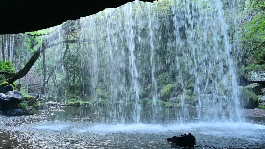 Scenery of Nabegataki Falls seen from behind at Kumamoto Royalty-Free Stock Footage #1045374064