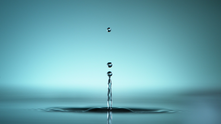Super slow motion of dripping water drop filmed with macro lens. Filmed on high speed cinema camera, 1000 fps. | Shutterstock HD Video #1045396915