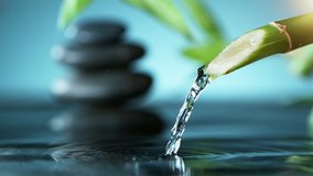 Super slow motion of leaking water stream from bamboo, spa and wellness concept. Filmed on very high speed cinema camera, 1000 fps. - Powered by Shutterstock - Get 15% off with code: PIKWIZARD15