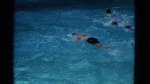 YONKERS NEW YORK-1953: Three Swimmer Are Swimming Freestyle In Swimming Pool And Near To Finish Line
