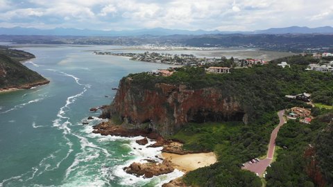 Aerial Drone Shot of Knysna South Africa Cliffs and Lookouts With Ocean Coastline on a Clear Summer Day