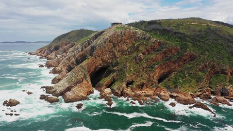 Aerial Drone Shot of Knysna South Africa Cliffs and Lookouts With Ocean Coastline on a Clear Summer Day