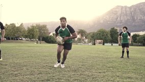 Rugby player with ball tackling the opponent during the match. Rugby players in action on the field. - Powered by Shutterstock - Get 15% off with code: PIKWIZARD15