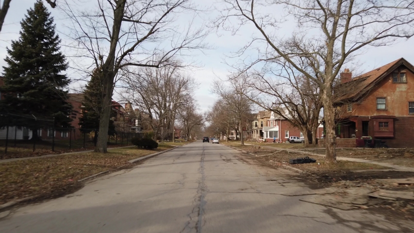 DETROIT, MI, USA - JANUARY 6, 2020: Driving plates forward front view Cadillac Blvd Detroit Michigan a high crime low income neighborhood with many vacant homes