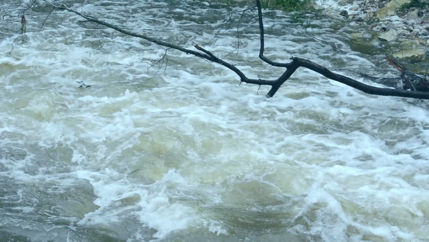 Swift waters cause currents and whirlpools in normally shallow creeks and rivers.  Flooding in Missouri causes a calm creek to become a raging river. 