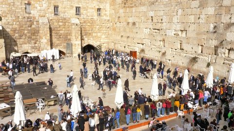 Jerusalem, Israel - January 17, 2020: Aerial view of People at Jerusalem Western wall,  a known worship place for Jewish people.