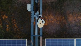Technician and investor Using Infrared Drone Technology to Inspect Solar Panels and Wind Turbines in Solar cell Farm, Solar cells will be an important renewable energy of the future. - Powered by Shutterstock - Get 15% off with code: PIKWIZARD15