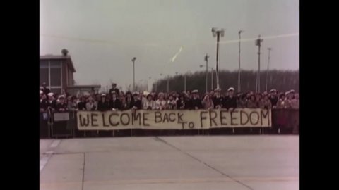 CIRCA 1981 - News anchors and a military band are seen at Andrews Air Force Base in anticipation of the arrival of returned Iran Crisis hostages.