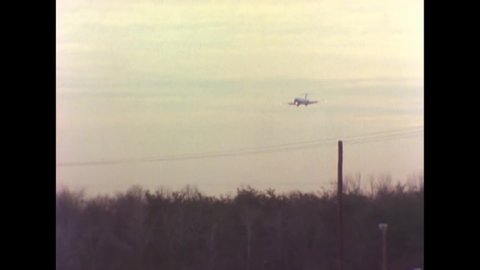 CIRCA 1981 - A plane lands at Andrews Air Force Base.