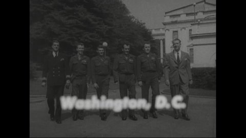 CIRCA 1940s - Newsreel footage shows Albert Einstein visiting an American defense plant.