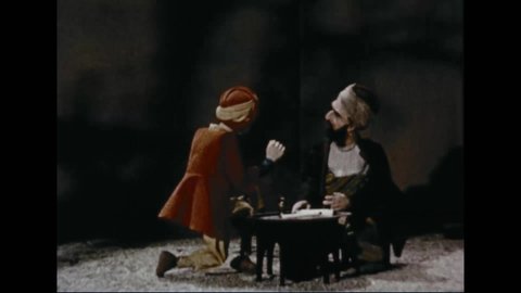 CIRCA 1960s - In this film told with marionettes, Nasreddin Hodja's friends are jealous when he becomes a judge.