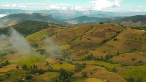 Aerial video in an amazing landscape, with drone, above rice terraces in a beautiful day.