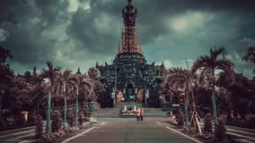 Traditional Bali temple on background dramatic cloudy sky, Indonesia
