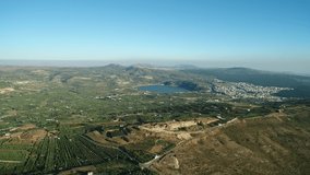 Long aerial shot of Lake Ram, Masade town & fields of Golan Heights. DJI_0026-04