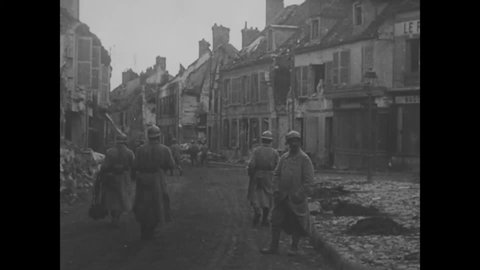 CIRCA 1918 - American soldiers explore the wreckage of several war-torn French villages.