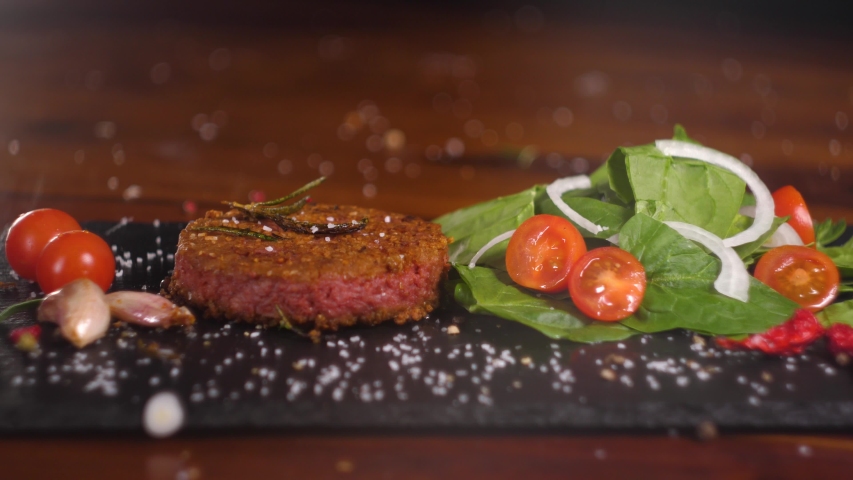 Plant based vegan burger meat, fake vegeterian beef meat close up, fresh impossible veggie food, beyond meat