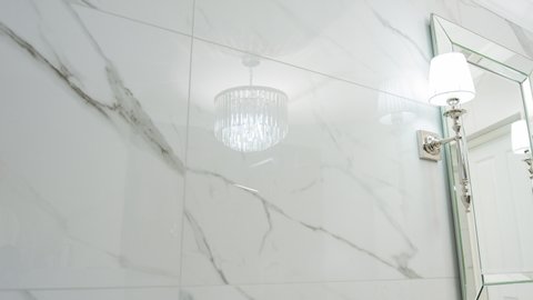 Stylish glamour luxurious bright bathroom, calacatta marble texture