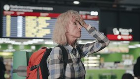 Coughing, dangerous symptoms of pheumonia or china coronavirus in public place. Portrait of sick caucasian female tourist travelle cough in international airport. People spread virus - Powered by Shutterstock - Get 15% off with code: PIKWIZARD15