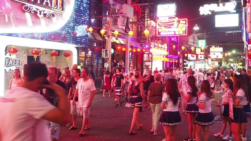 Pattaya, Thailand - January 20, 2020: Famous red light district Walking street in Pattaya with many clubs, bars and prostitutes. The street is a tourist attraction for night life and entertainment. 