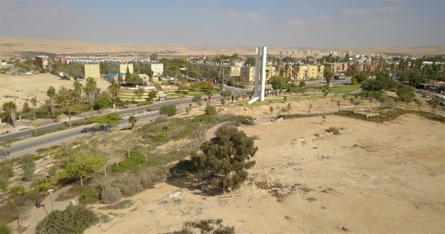 Aerial footage over Yeruham city and monument park 
Drone view over  Yeruham town in the Southern District of Israel, in the Negev desert 
