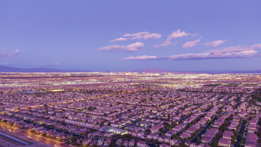 Las Vegas Cityscape at Sunset. Nevada, USA. Aerial Hyper Lapse, Time Lapse. Drone Flies Sideways and Upwards