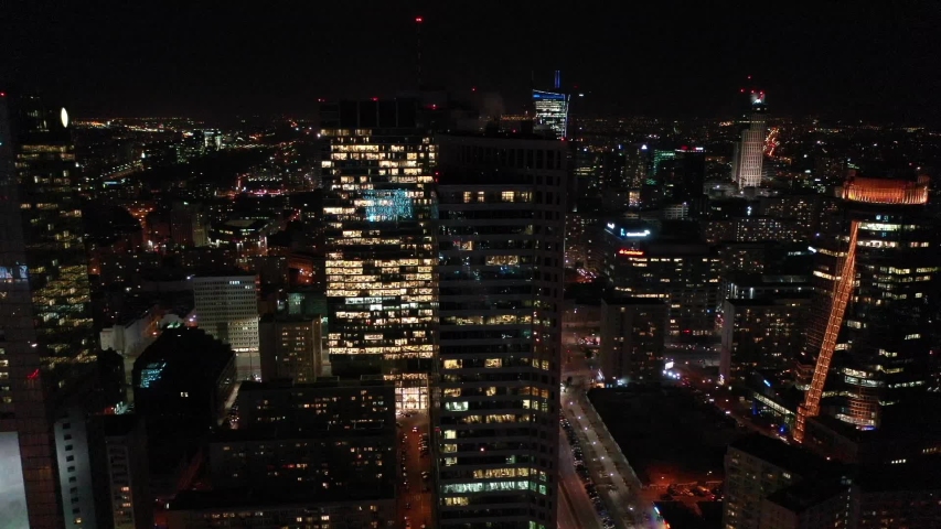 Night Aerial View of Polish Capital Warsaw With Business Office Buildings and Skyscrapers
