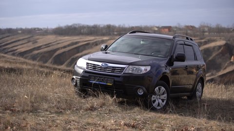 Old Kodaki, UKRAINE - JANUARY 31, 2020: Subaru Forester car stand off road