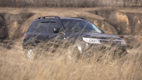 Old Kodaki, UKRAINE - JANUARY 31, 2020: Subaru Forester car stand off road