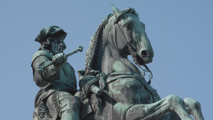 VIENNA AUSTRIA close up shot of Prince Eugen equestrian statuette in front of Hofburg Palace library at the Heldenplatz in the center of Vienna, tourist attraction, background blue sky