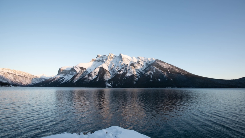 Time lapse view of Lake Minnewanka at sunset in Banff National Park, Canadian Rockies, Alberta, Canada.