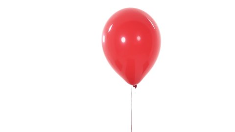 Close-up demonstration video of a red balloon flying up and disappearing from camera view. Inflatable balloon. Isolated, on white background