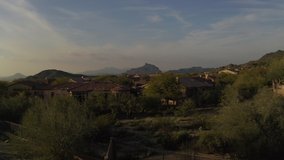 A 4k high resolution clip of east Mesa Arizona real estate on the side of a mountain.