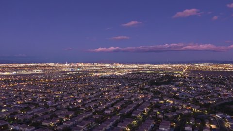 Las Vegas Skyline in Evening Twilight. Nevada, USA. Aerial Hyper Lapse, Time Lapse. Drone Flies Sideways