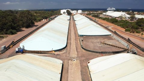Esperance, Western Australia - Jan 8 2020: Aerial view of wheat storage, grain handlers and bluk heads near Esperance Port, looking out to Esperance Bay