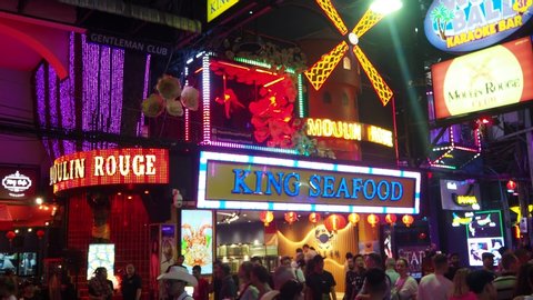 Pattaya, Thailand - January 20, 2020: Famous red light district Walking street in Pattaya with many clubs, bars and prostitutes. The street is a tourist attraction for night life and entertainment. 