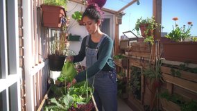 Young girl watering vegetables on terrace - Powered by Shutterstock - Get 15% off with code: PIKWIZARD15