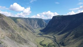 Aerial video view from landing down drone on the valley of Altai river Chulyshman canyon. Siberia, Russia. 