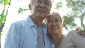 loving asian senior couple enjoying sunshine outdoors - Powered by Shutterstock - Get 15% off with code: PIKWIZARD15