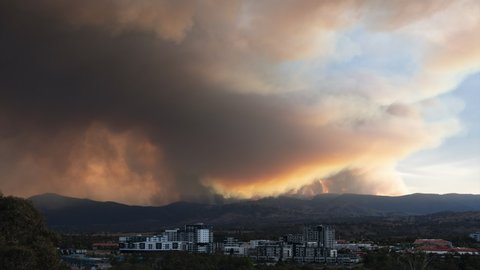 CANBERRA, ACT / AUSTRALIA - January 28 2020: Bushfires approach Canberra's southern suburbs, time-lapse