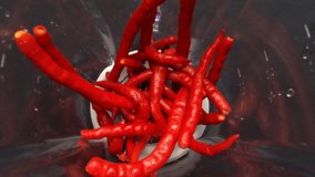 Hot Red Chili Peppers Poured By Fresh Water To Wash And Clean In Blender As A Healthy Nutrition Food And Drink For Vegetarian Also For Spicy Food Or Dish, RAW Full HD And 4K Video. 