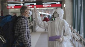 Prevention of transmission Novel Coronavirus Covid-19  2019-nCoV. Screening passengers, travellers for Chinese virus symptoms. Temperature checkpoints in International airports. People may be infected - Powered by Shutterstock - Get 15% off with code: PIKWIZARD15