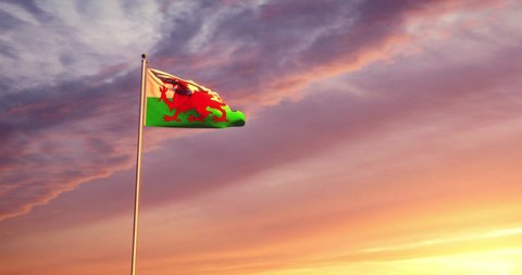 Welsh flag waving represents the country of Wales and Capital Cardiff. For tourism nationality and patriotism - 4k