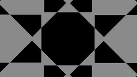 Graphic object in the shape of a crown, in black and white with stroboscopic and hypnotic effect, which rotates clockwise, decreasing the size from the full screen to the disappearance in the center.