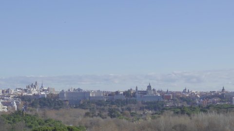 Madrid, Spain. City skyline with the Cathedral de la Almudena and Madrid Royal Palace.Panning right to left and zooming out